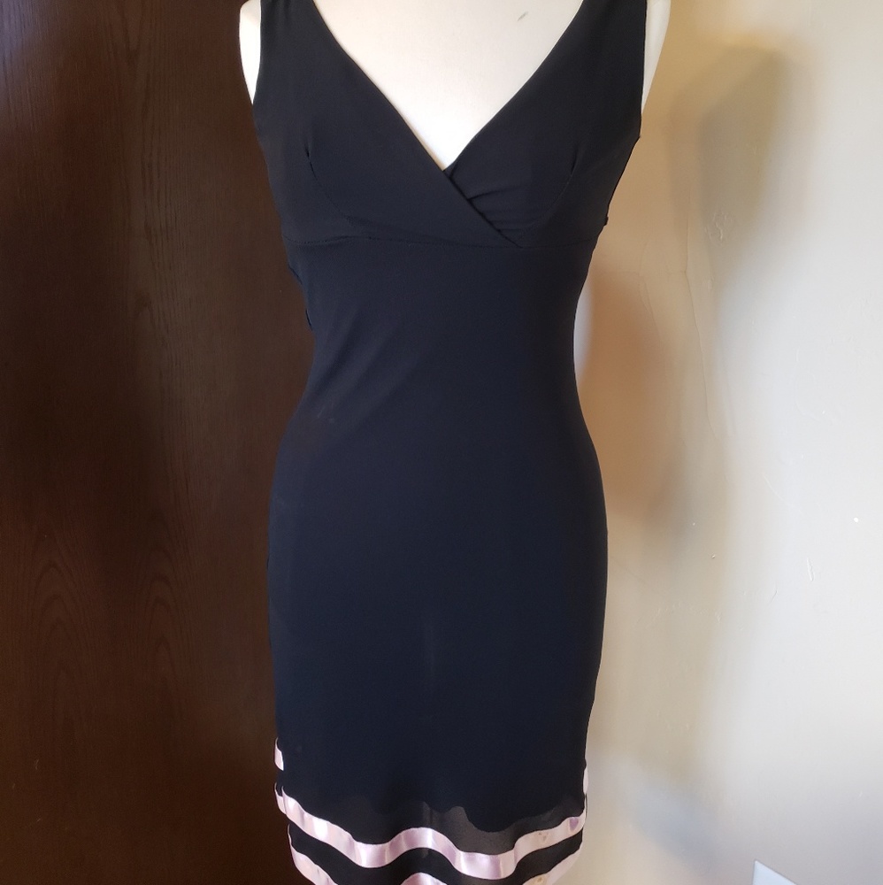 Black dress with pink ribbon lining